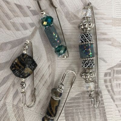 Spille con perle di carta 